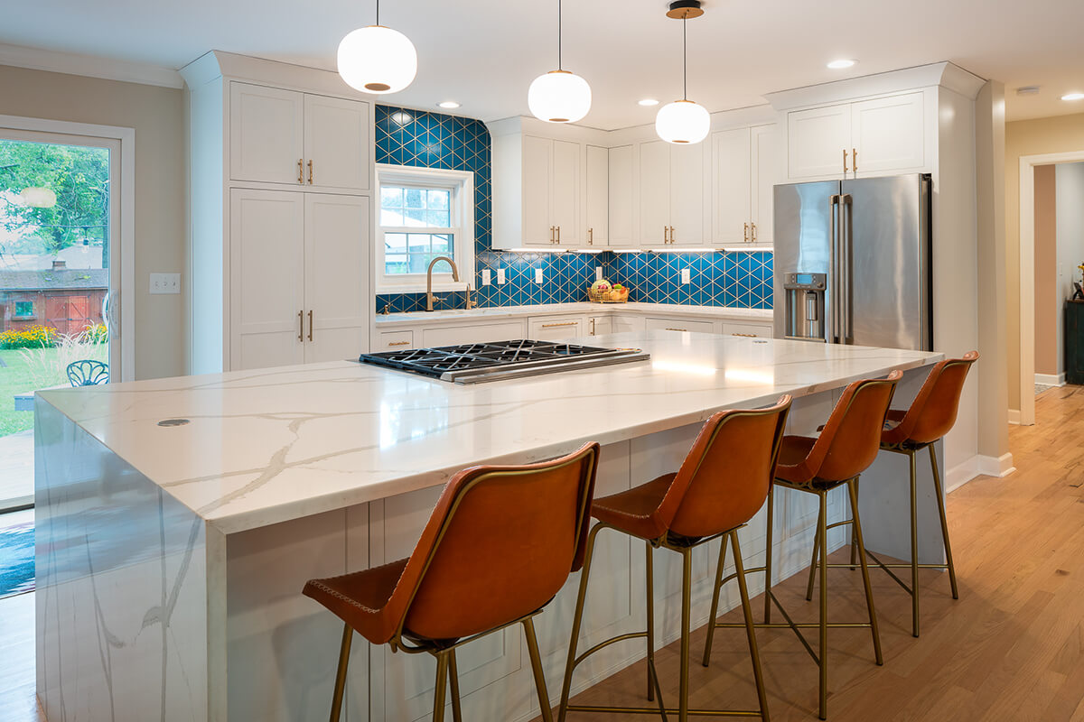 Madeira Boho-Modern Renovation - kitchen with blue backsplash