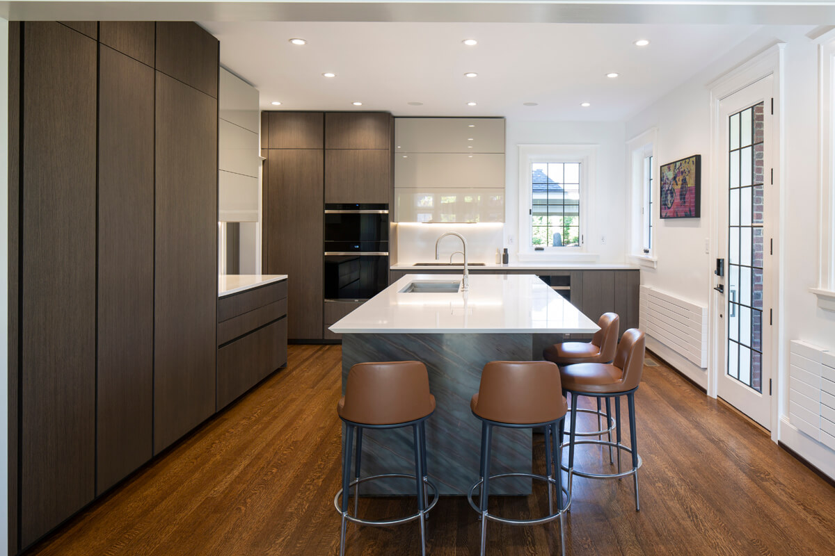 Hyde Park Modern Kitchen - Modern Kitchen design with a combination of sleek yet warm materials - wood, stone, lacquered cabinet fronts, quartz countertops and stainless steel accents in this classic Hyde Park home.